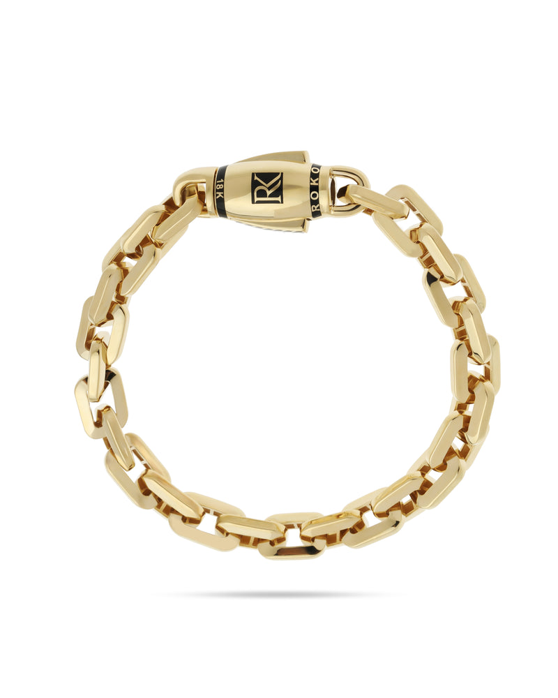 Gold chain bracelet with a clasp on a white background