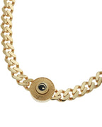 Gold chain bracelet with a decorative clasp on a white background
