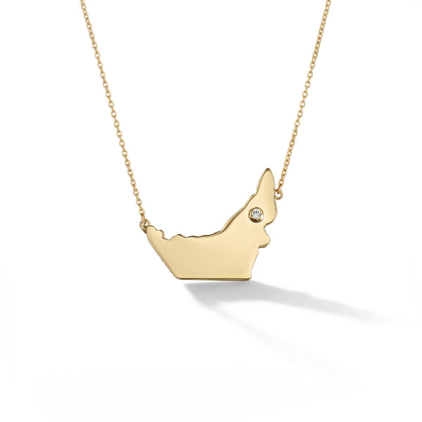 Plain gold UAE map pendant necklace on white background — 18K hallmark certified