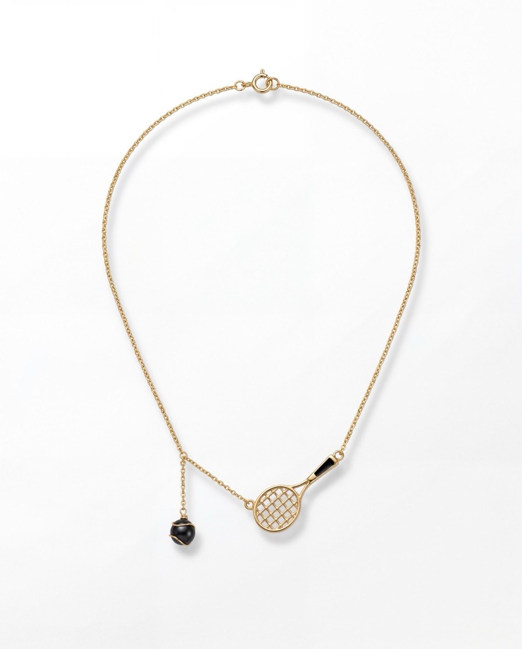 Gold necklace with a tennis racket and ball pendant on a white background